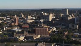 5.7K aerial stock footage of passing by city buildings in Downtown Rochester, New York Aerial Stock Footage | DX0002_209_020