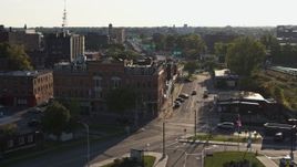 5.7K aerial stock footage of a brick office building and Central Avenue in Downtown Rochester, New York Aerial Stock Footage | DX0002_209_022