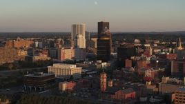 5.7K aerial stock footage orbit First Federal Plaza and office buildings at sunset, Downtown Rochester, New York Aerial Stock Footage | DX0002_209_031