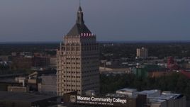 5.7K aerial stock footage orbit top of Kodak Tower at twilight, Rochester, New York Aerial Stock Footage | DX0002_210_009