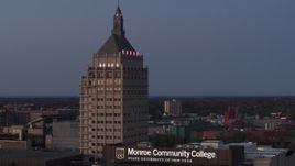 5.7K aerial stock footage fly away from Kodak Tower at twilight and descend, Rochester, New York Aerial Stock Footage | DX0002_210_011