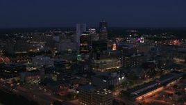 5.7K aerial stock footage of a wide view of the city's skyline at night, Downtown Rochester, New York Aerial Stock Footage | DX0002_210_021