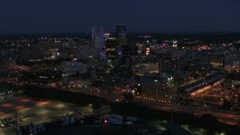 5.7K aerial stock footage flyby and approach the city's night at twilight, Downtown Rochester, New York Aerial Stock Footage | DX0002_210_022