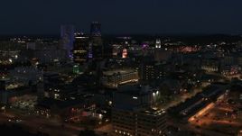 5.7K aerial stock footage ascend and orbit office buildings at night, Downtown Rochester, New York Aerial Stock Footage | DX0002_210_028