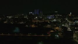5.7K aerial stock footage of approaching the Genesee River and skyline at night, Downtown Rochester, New York Aerial Stock Footage | DX0002_210_042