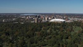5.7K aerial stock footage of flyby cemetery, Carrier Dome and Downtown Syracuse, New York Aerial Stock Footage | DX0002_211_003