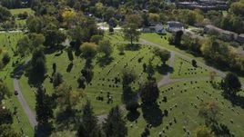 5.7K aerial stock footage of orbiting gravestones at Morningside Cemetery in Syracuse, New York Aerial Stock Footage | DX0002_211_010