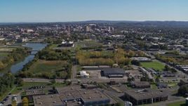 5.7K aerial stock footage of a wide view of Downtown Syracuse, New York from Onondaga Creek Aerial Stock Footage | DX0002_211_012