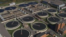 5.7K aerial stock footage of a sewage treatment plant in Syracuse, New York Aerial Stock Footage | DX0002_211_015