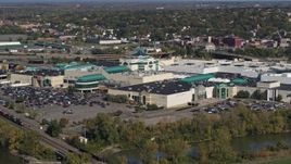 5.7K aerial stock footage of a reverse view of a shopping mall in Syracuse, New York Aerial Stock Footage | DX0002_211_027