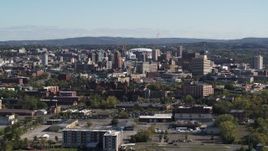 5.7K aerial stock footage of flying by the city's downtown area, Downtown Syracuse, New York Aerial Stock Footage | DX0002_212_002