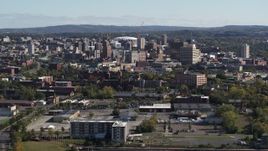 5.7K aerial stock footage ascend for wide view of the city's downtown area, Downtown Syracuse, New York Aerial Stock Footage | DX0002_212_004