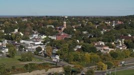 5.7K aerial stock footage of approaching the St John the Baptist church steeple in Syracuse, New York Aerial Stock Footage | DX0002_212_014