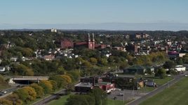 5.7K aerial stock footage of descending past Assumption Church in Syracuse, New York Aerial Stock Footage | DX0002_212_017