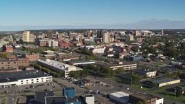 5.7K aerial stock footage of the city's downtown area while ascending by office buildings, Downtown Syracuse, New York Aerial Stock Footage | DX0002_212_029