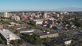 5.7K aerial stock footage of flying away from the city's downtown area, Downtown Syracuse, New York Aerial Stock Footage | DX0002_212_035