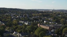 5.7K aerial stock footage of church steeples near homes in Syracuse, New York Aerial Stock Footage | DX0002_213_001
