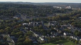 5.7K aerial stock footage of flying by church and a neighborhood in Syracuse, New York Aerial Stock Footage | DX0002_213_003