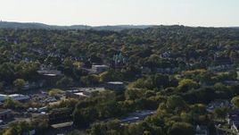 5.7K aerial stock footage orbit a Catholic church and a neighborhood in Syracuse, New York Aerial Stock Footage | DX0002_213_007