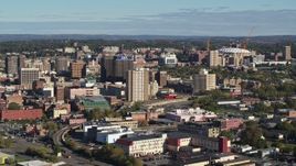 5.7K aerial stock footage of slowly passing by office buildings in Downtown Syracuse, New York Aerial Stock Footage | DX0002_213_010
