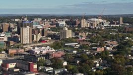 5.7K aerial stock footage of office buildings near Carrier Dome stadium in Downtown Syracuse, New York Aerial Stock Footage | DX0002_213_011