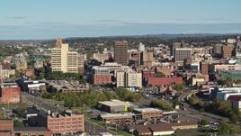 5.7K aerial stock footage a reverse view of office buildings in Downtown Syracuse, New York Aerial Stock Footage | DX0002_213_014