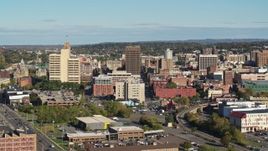 5.7K aerial stock footage reverse view of office buildings before descent in Downtown Syracuse, New York Aerial Stock Footage | DX0002_213_016