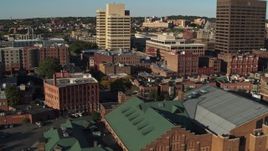 5.7K aerial stock footage of ascending by museum to reveal office buildings, Downtown Syracuse, New York Aerial Stock Footage | DX0002_213_039