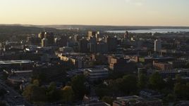 5.7K aerial stock footage of downtown seen from Syracuse University at sunset, New York Aerial Stock Footage | DX0002_214_015