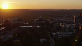 5.7K aerial stock footage of orbiting Crouse Hospital in Downtown Syracuse at sunset, New York Aerial Stock Footage | DX0002_214_032