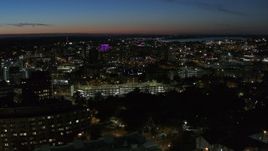 5.7K aerial stock footage city buildings in Downtown Syracuse at twilight, seen from university, New York Aerial Stock Footage | DX0002_215_005