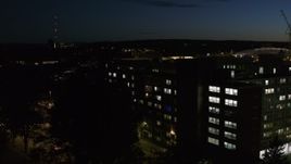 5.7K aerial stock footage of circling university dormitory at twilight, Syracuse, New York Aerial Stock Footage | DX0002_215_010