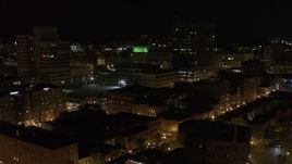 5.7K aerial stock footage of One Lincoln Center and city buildings at night, Downtown Syracuse, New York Aerial Stock Footage | DX0002_215_038