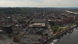 5.7K aerial stock footage orbit and fly away from downtown area of Troy, New York Aerial Stock Footage | DX0002_216_002