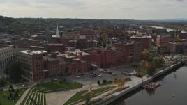 5.7K aerial stock footage flying by park, music hall and brick buildings the downtown area of Troy, New York Aerial Stock Footage | DX0002_216_013