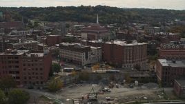 5.7K aerial stock footage flying away from music hall and brick buildings the downtown area of Troy, New York Aerial Stock Footage | DX0002_216_014