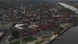5.7K aerial stock footage orbit brick buildings the downtown area of Troy, New York, reveal riverfront park Aerial Stock Footage | DX0002_216_015