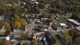 5.7K aerial stock footage of flying away from a small town intersection in Fort Edward, New York Aerial Stock Footage | DX0002_216_018