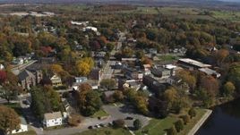 5.7K aerial stock footage of a reverse view of a small town intersection in Fort Edward, New York Aerial Stock Footage | DX0002_216_019