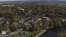 5.7K aerial stock footage approach and orbit buildings around a small town intersection in Fort Edward, New York Aerial Stock Footage | DX0002_216_024