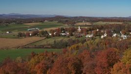 5.7K aerial stock footage orbit farm fields and the small town of Orwell, Vermont Aerial Stock Footage | DX0002_217_005