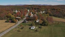 5.7K aerial stock footage circling Main Street in a small town in autumn, Orwell, Vermont Aerial Stock Footage | DX0002_217_013