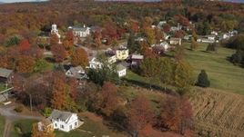 5.7K aerial stock footage approach and orbit a small town in autumn, Orwell, Vermont Aerial Stock Footage | DX0002_217_014