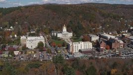 5.7K aerial stock footage of a reverse view of the state capitol building and downtown in Montpelier, Vermont Aerial Stock Footage | DX0002_218_003