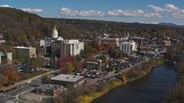 5.7K aerial stock footage fly over river toward government office and state capitol building, Montpelier, Vermont Aerial Stock Footage | DX0002_218_016