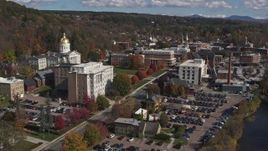 5.7K aerial stock footage reverse view of government office and state capitol building near the river, Montpelier, Vermont Aerial Stock Footage | DX0002_218_017