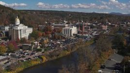 5.7K aerial stock footage of downtown buildings and smoke stack by the river, Montpelier, Vermont Aerial Stock Footage | DX0002_218_018