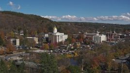 5.7K aerial stock footage fly over river toward government offices and state capitol building, Montpelier, Vermont Aerial Stock Footage | DX0002_218_023