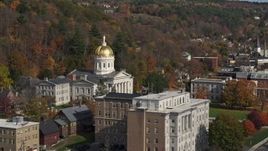 5.7K aerial stock footage of the state capitol dome behind a government office building, Montpelier, Vermont Aerial Stock Footage | DX0002_218_037