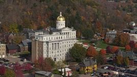 5.7K aerial stock footage fly toward the state capitol dome behind a government office building, Montpelier, Vermont Aerial Stock Footage | DX0002_218_038